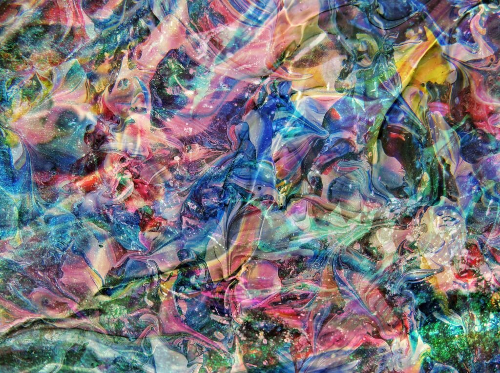 Dynamic abstract art with vivid colors and swirling patterns, creating a sense of motion and creativity.